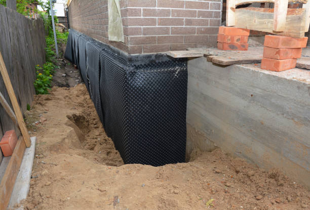 SJ Waterproofing Pros technician performing targeted Basement Waterproofing assessment in Lexington, OH